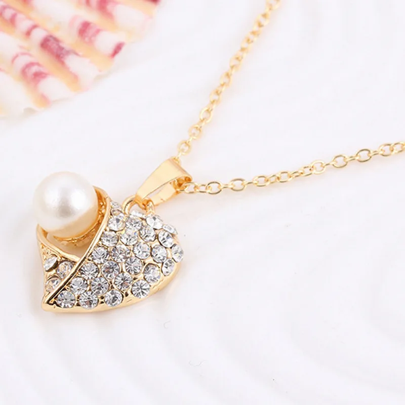 Свитер от производителя ожерелий Ebay с персиковым сердцем и жемчугом в Европе США