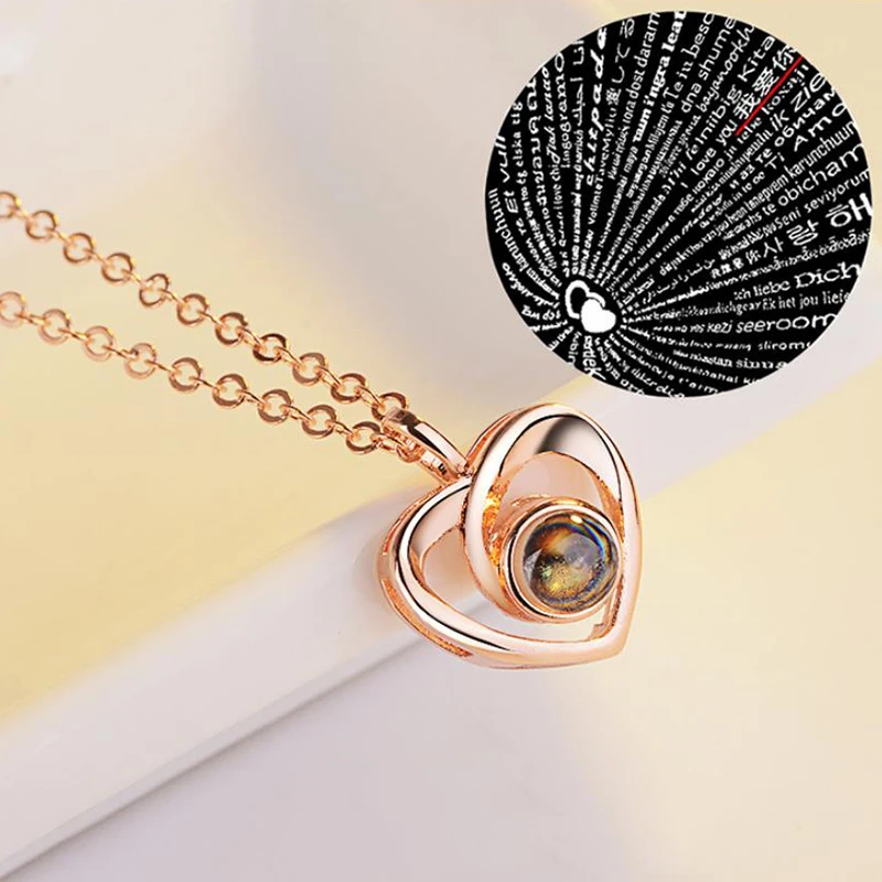 Сердце ожерелье сердце ювелирные изделия 100 языков Lover легкие Проекционные ювелирные изделия кулон 100 языков я люблю тебя