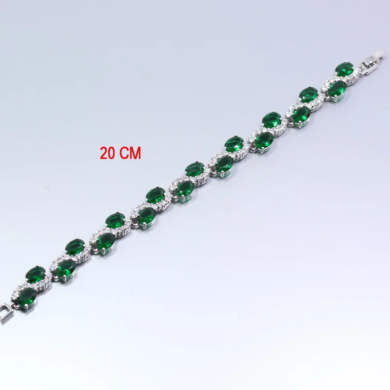 Кольцо-брелок от Manny с зеленым цирконом серебристого цвета размер кольца 6-7-8-9-10