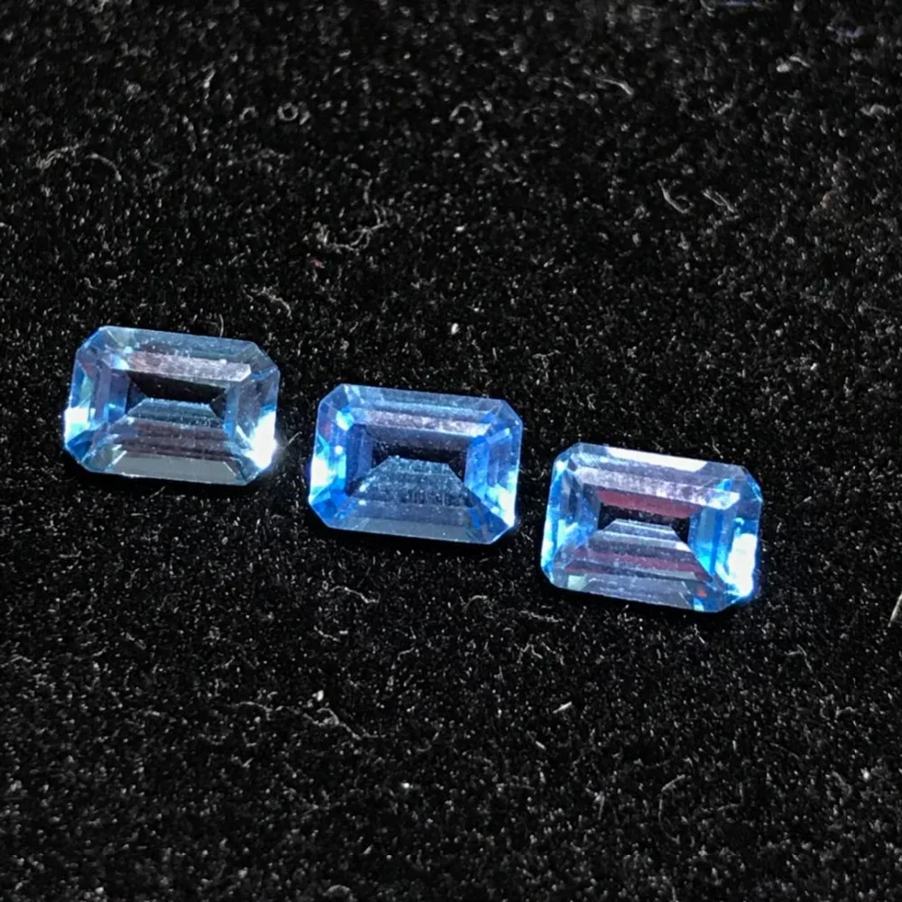 

VVS 5 mm * 7mm emerald cut topaz gemstone real natural light blue topaz loose stone for jewelry shop