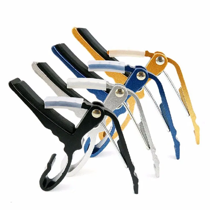 Укулеле с маленьким тональным зажимом музыкальная гитара в фольклорном стиле