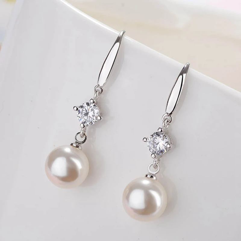Серьги-подвески из пресноводного жемчуга с белыми каплевидными жемчужинами