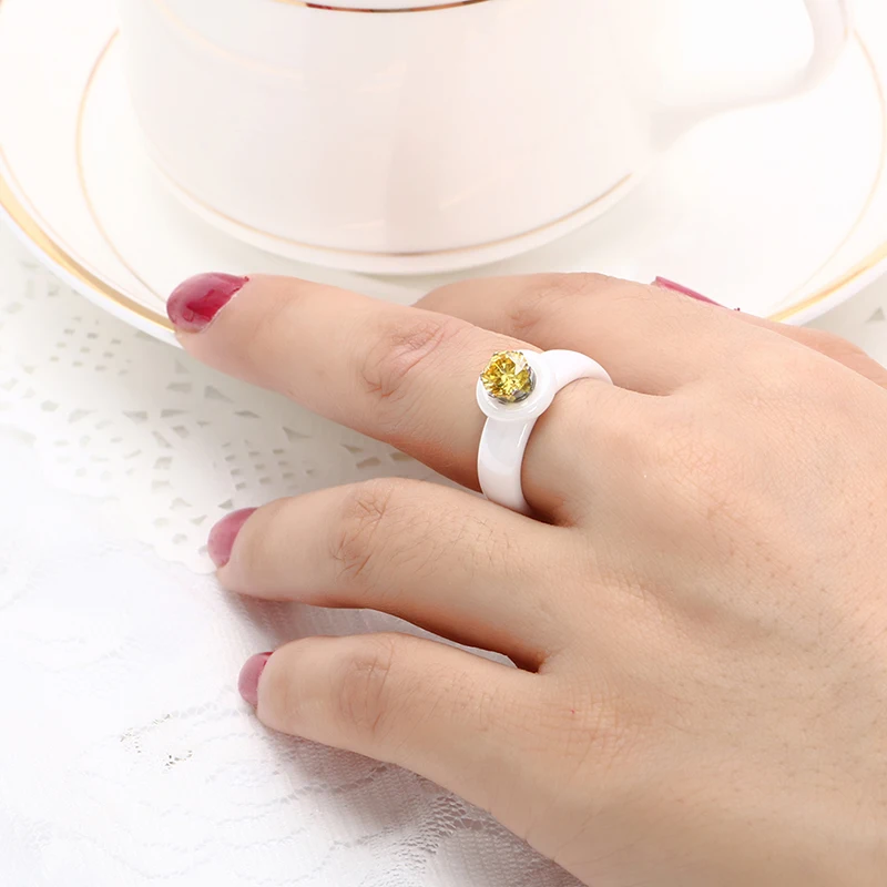 Женское и мужское обручальное кольцо с натуральным желтым цирконием