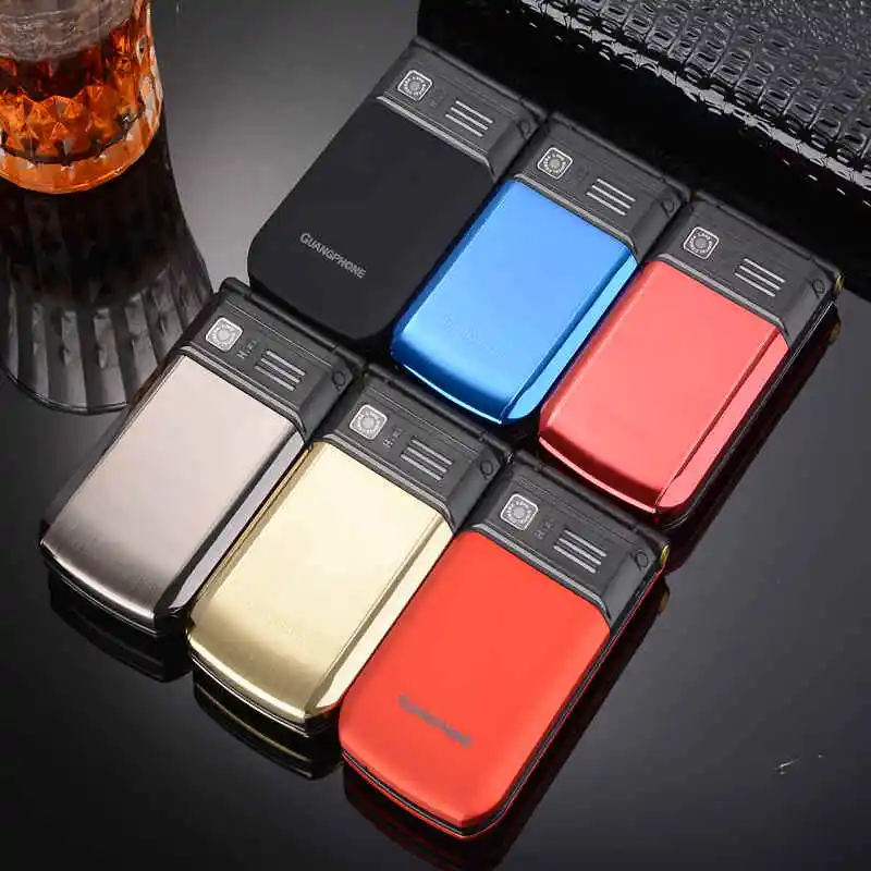 Мобильный телефон с откидным сенсорным экраном две SIM карты FM MP3 плеер SOS русская