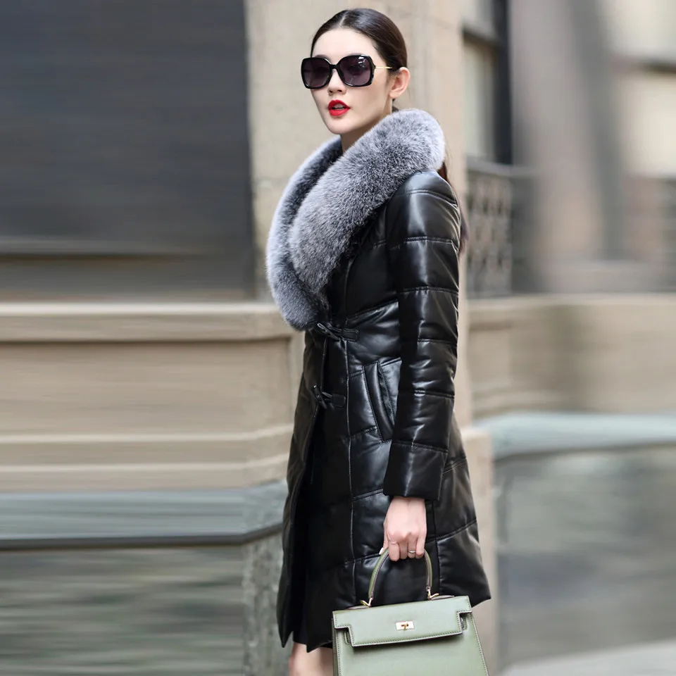 Женское пальто из овечьей кожи черное приталенное длинное натуральной с