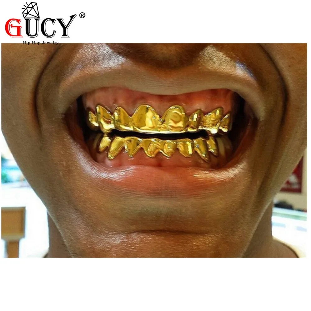 Gucy индивидуальный стиль хип хоп grillz Gold Цвет покрытием капельного Стиль зубы гриль в форме нижней части зуба грили подарок на Хэллоуин