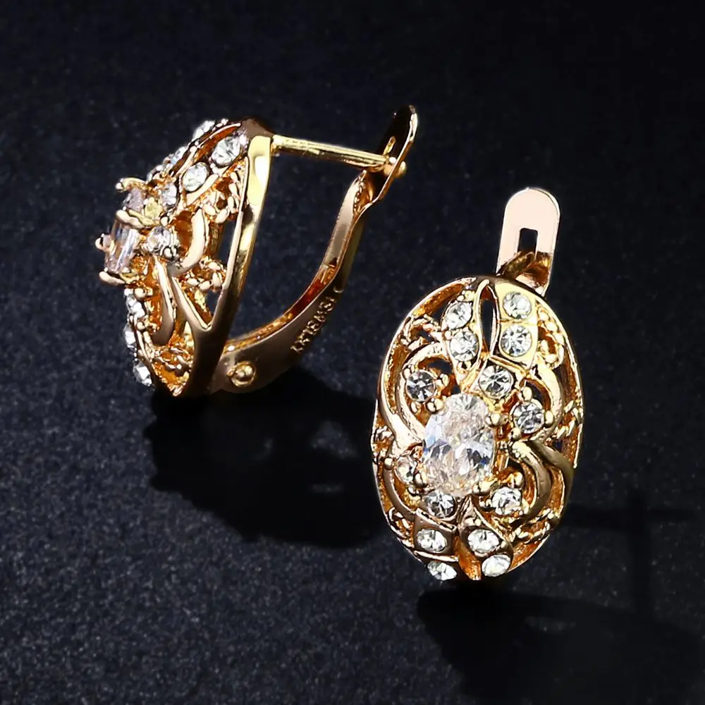 Женские серьги гвоздики OCESRIO из розового золота 585 пробы с овальным цирконием