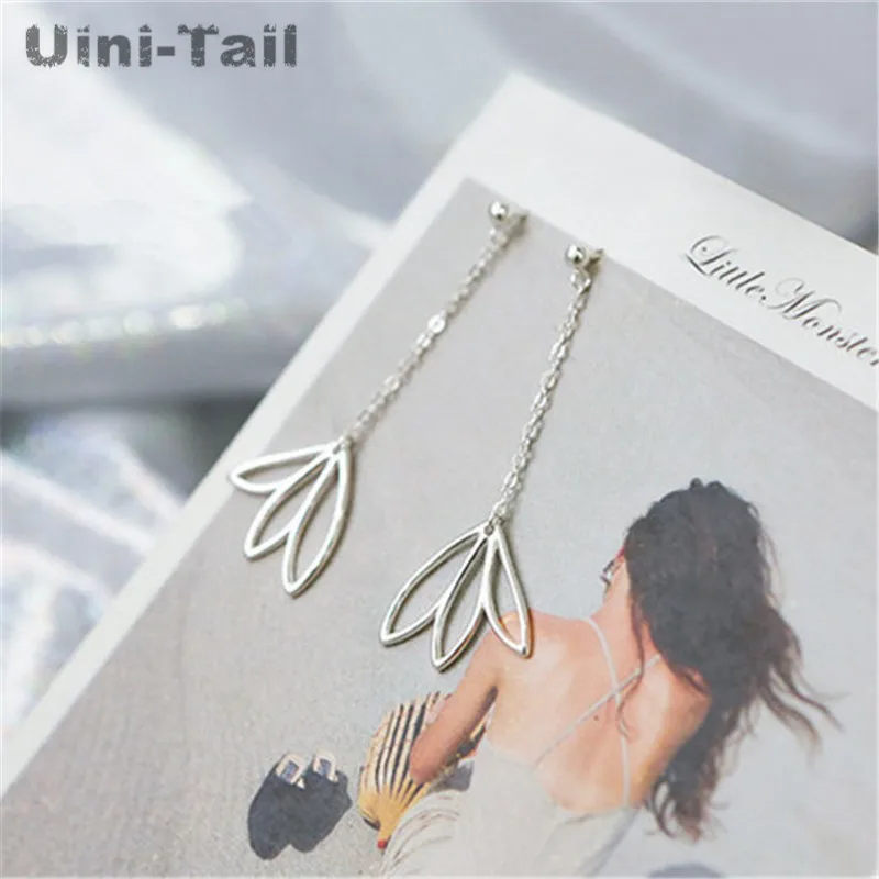 Серьги Uini-Tail гипоаллергенные из серебра 925 пробы с полыми тремя листьями |