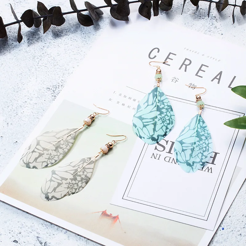 QIANKE Bohemian Big Feather Drop Earrings for Women Statement Ethnic Boho Long Dangle Fashion Jewelry Gift Wholesale |
