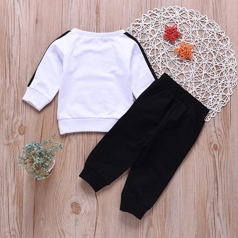 Новые модные комплекты одежды для маленьких мальчиков и девочек черно-белая