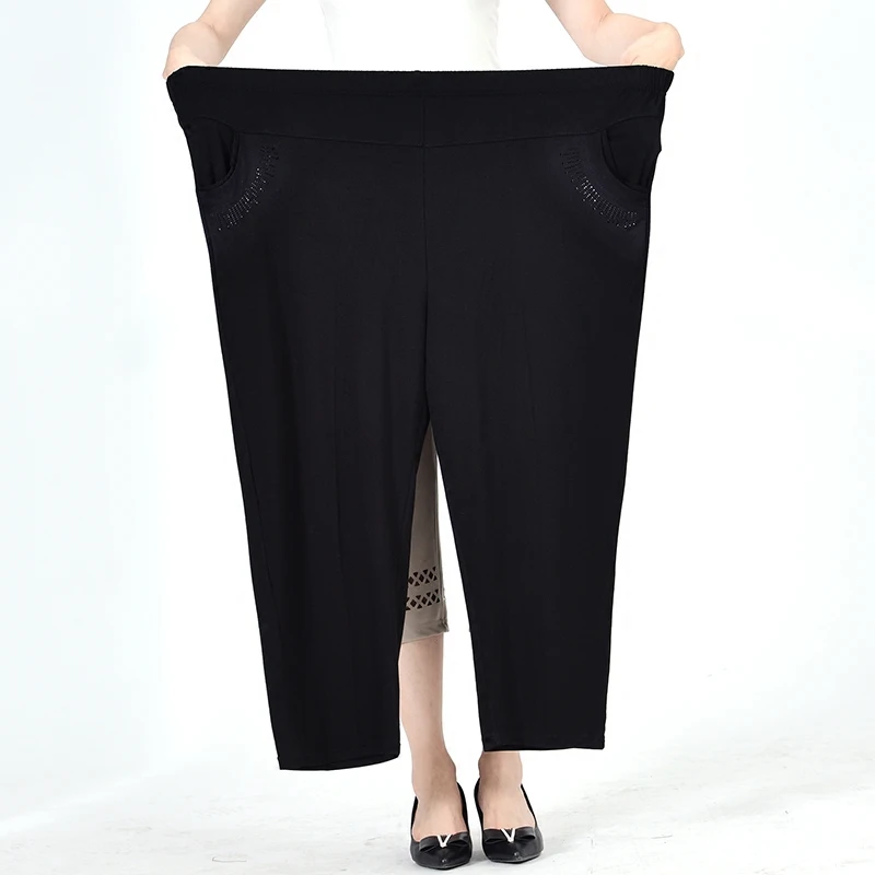 Женские брюки большого размера свободные эластичные средней длины на весну и