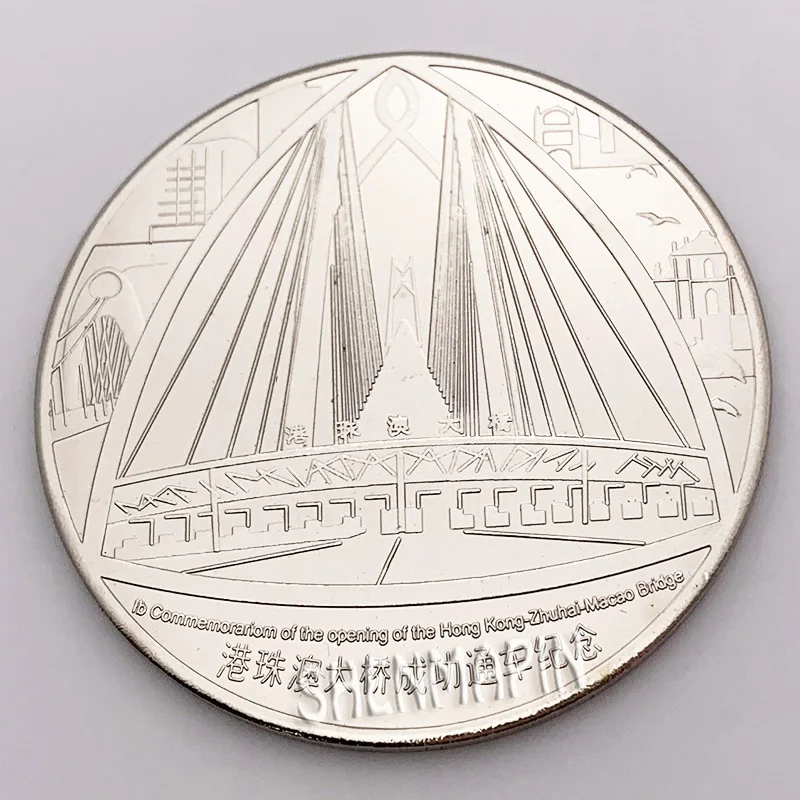 Мост Гонконг-Чжухай-Макао успешно открылся для движения памятных монет один из