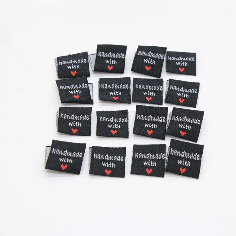 150 шт. в наличии этикетки для одежды черные письма ручной работы с сердечным