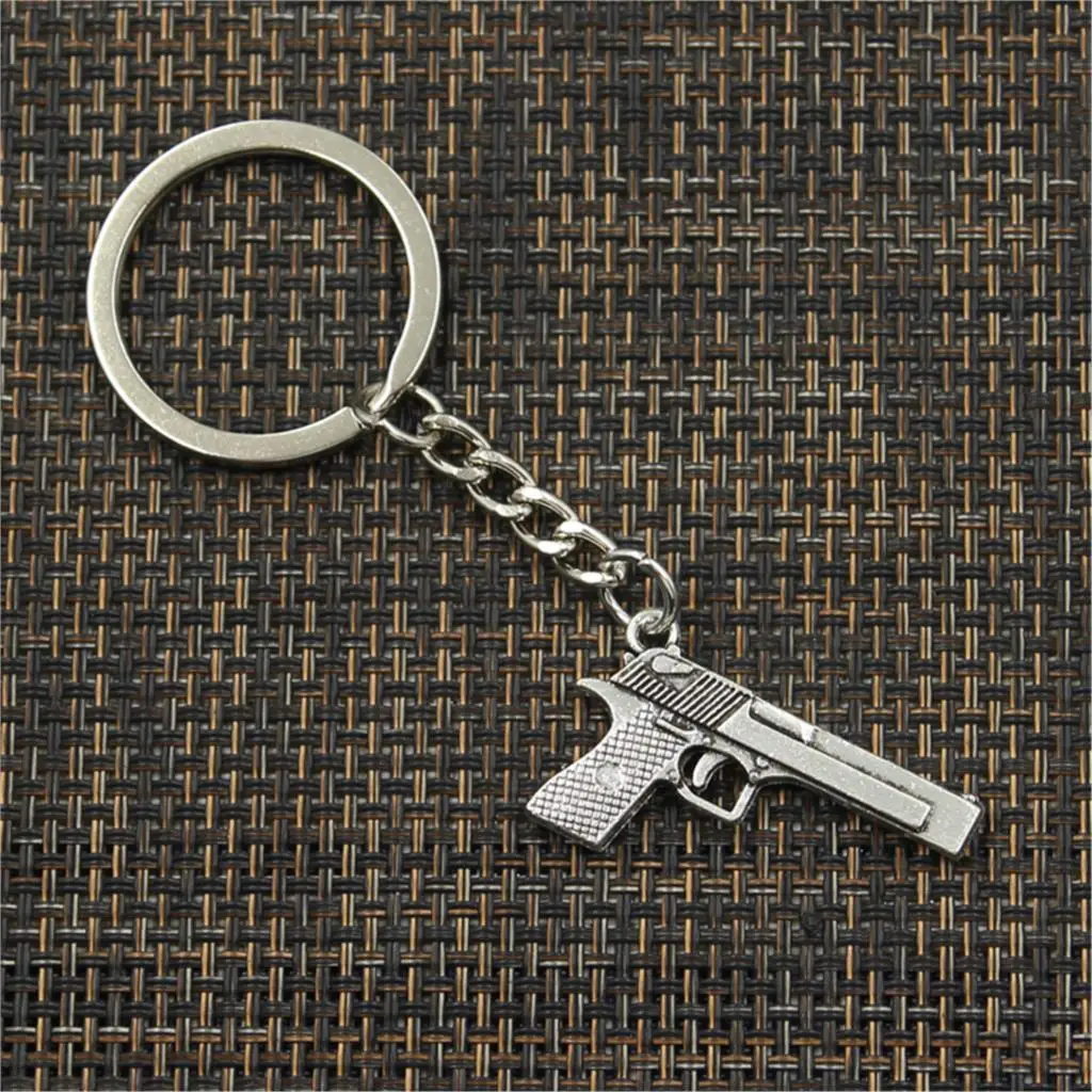 

New Fashion Men 30mm Keychain DIY Metal Holder Chain Vintage Gun Browning Pistol 45x20mm Silver Color Pendant Gift