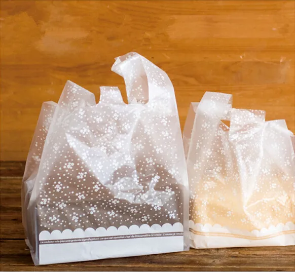 

Free shipping clear white flower polka dot decoration plastic packing bags gift dessert bags dessert biscuit hand portable bag