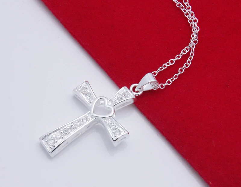 Серебряная цепочка с цирконием и вырезами в виде сердечек крест серебряная