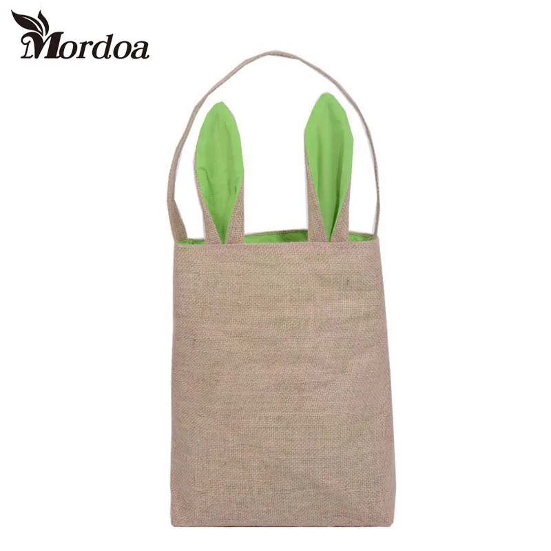 Классическая тканевая корзина с кроличьими ушками положите пасхальные яйца