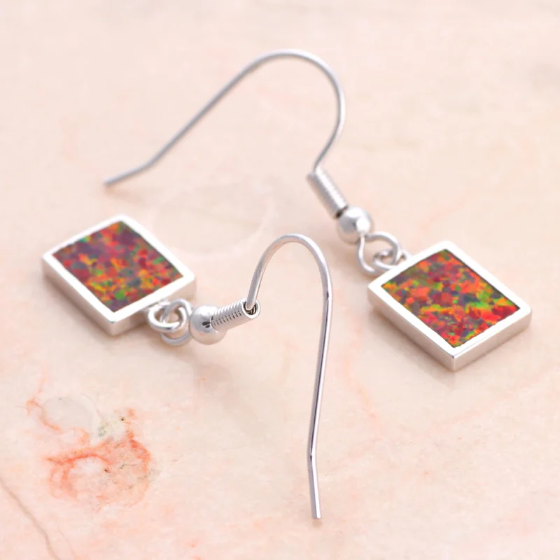 Женские прямоугольные серьги-подвески ROLILASON с коричневым огненным опалом |