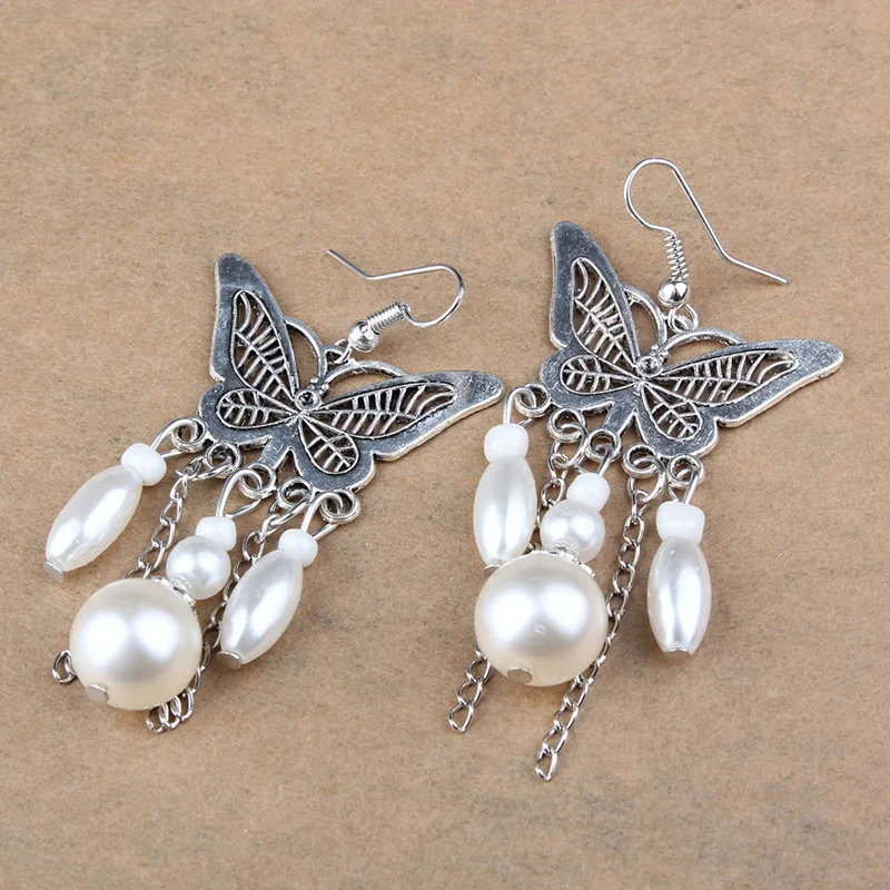 Нильсен новые женские длинные вечерние серьги Пункт Ретро полые жемчуг бабочки