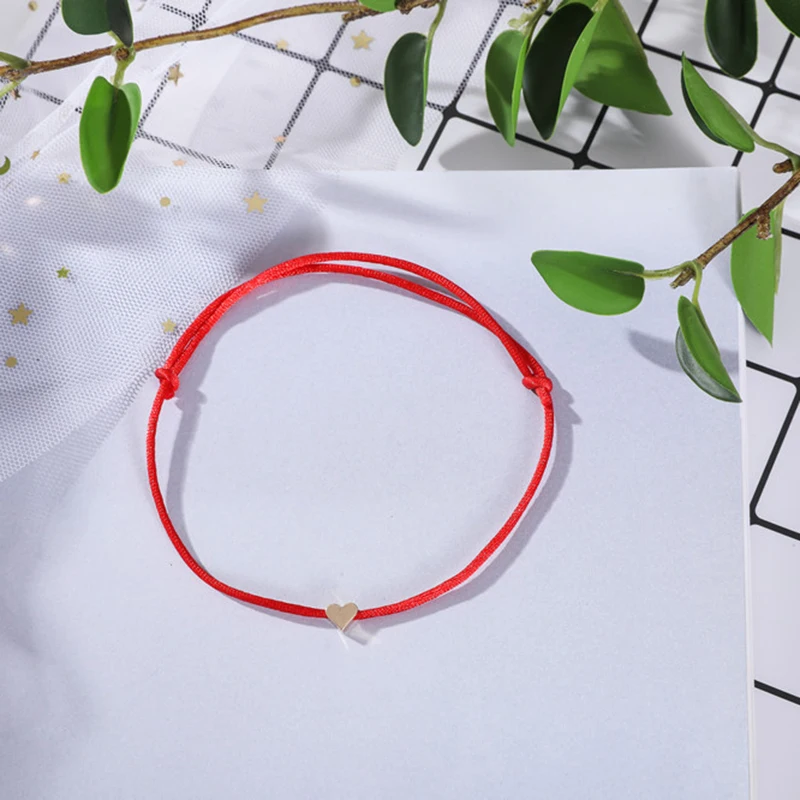 Браслет ручной работы с сердцем золотого цвета ювелирное изделие разных цветов