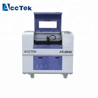 factory price mini laser engraver 6040 6090 co2 laser engraving machine with 60w 80w laser tube