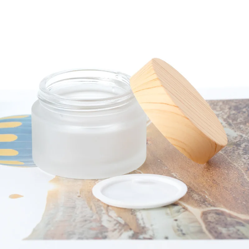 

50pcs 5g 10g 15g 30g 50g Scrub Cream Bottle Glass Eye Cream Mask Empty Jar Wood Grain Cover Cosmetic Packaging