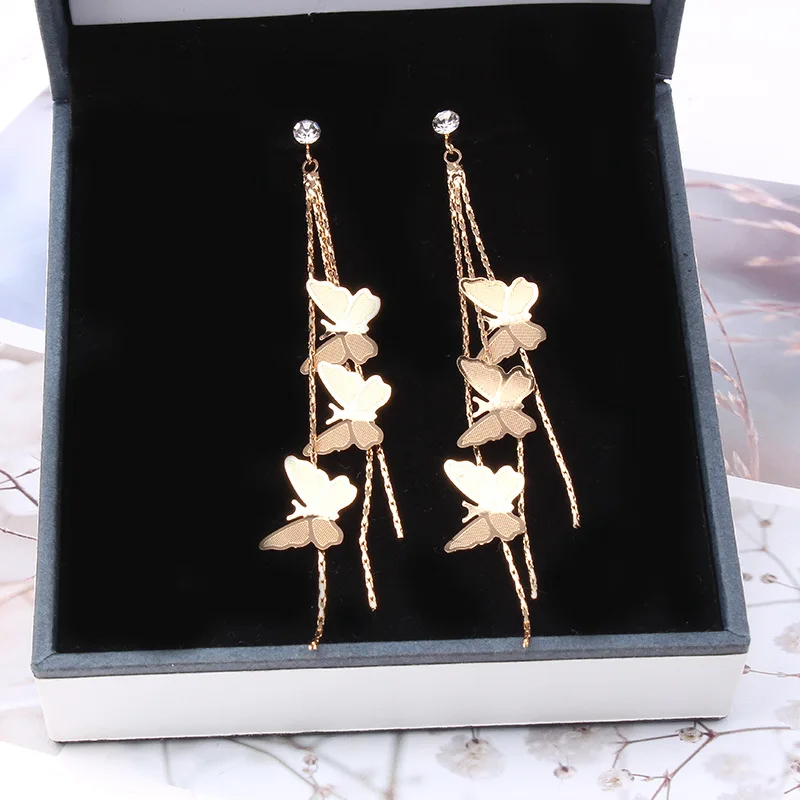 8 сезонов модные серьги-гвоздики золотистого и серебряного цветов с бабочкой