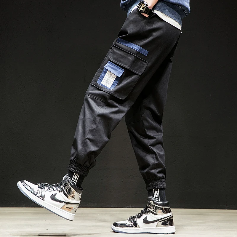 Новинка мужские брюки повседневные года 2019 одноцветное мотобрюки весна Фитнес