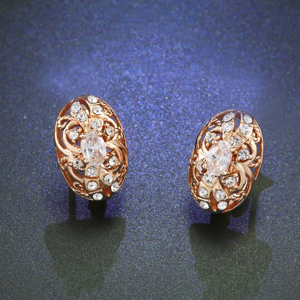 Женские серьги гвоздики OCESRIO из розового золота 585 пробы с овальным цирконием