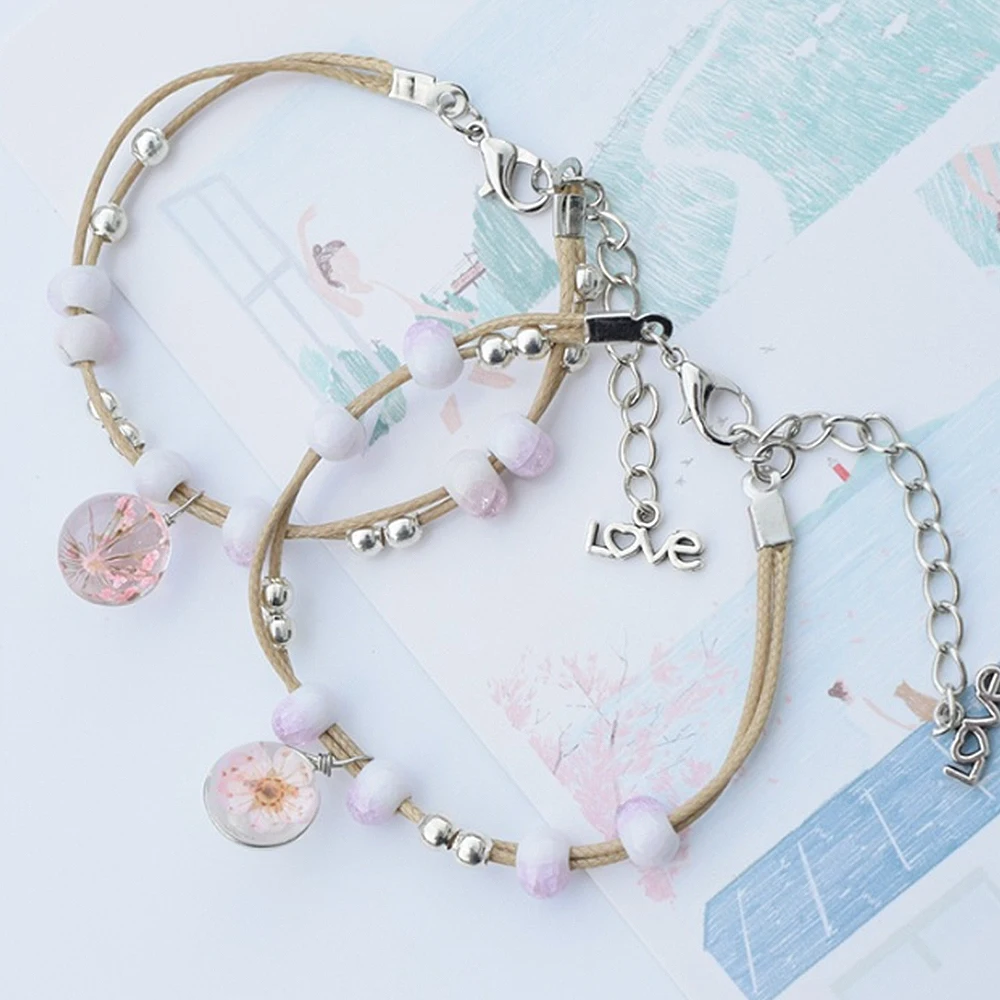 Женский браслет ручной работы плетеный из сухоцветов с одуванчиком и