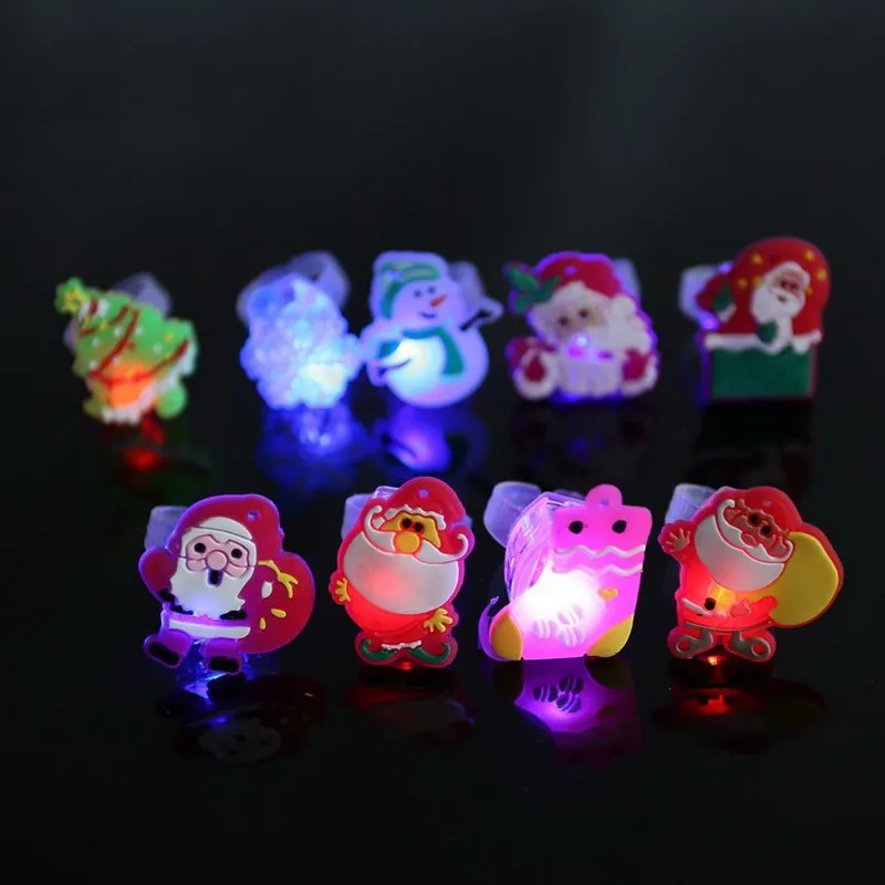 

Kids Cartoon LED Flashing Light Up Glowing Finger Ring Electronic Christmas Halloween Baby Fun Toys Party Gifts for Children