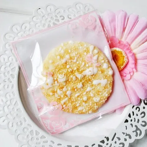 

Free shipping white pink rose flower decoration transparent cookie/candy/dessert bag gift packing self-adhesive plastic bags