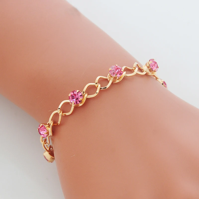 Женский браслет с цепочкой винтажный золотого цвета розовыми кристаллами для