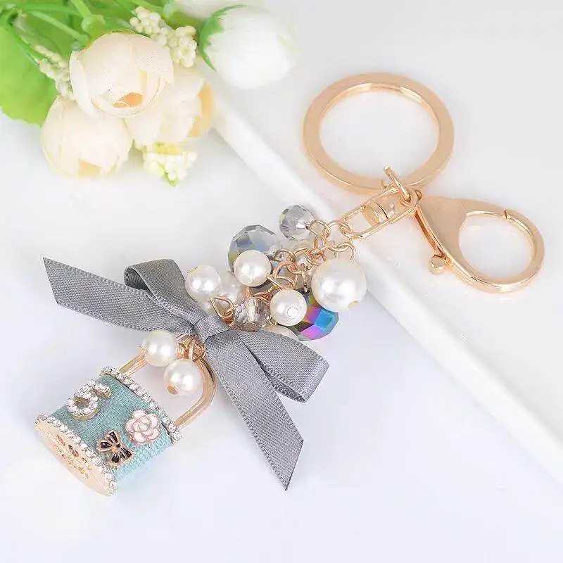 New pearl bow key chain personalized lock crystal ring car chains female bag pendant accessories keychain Дом и сад