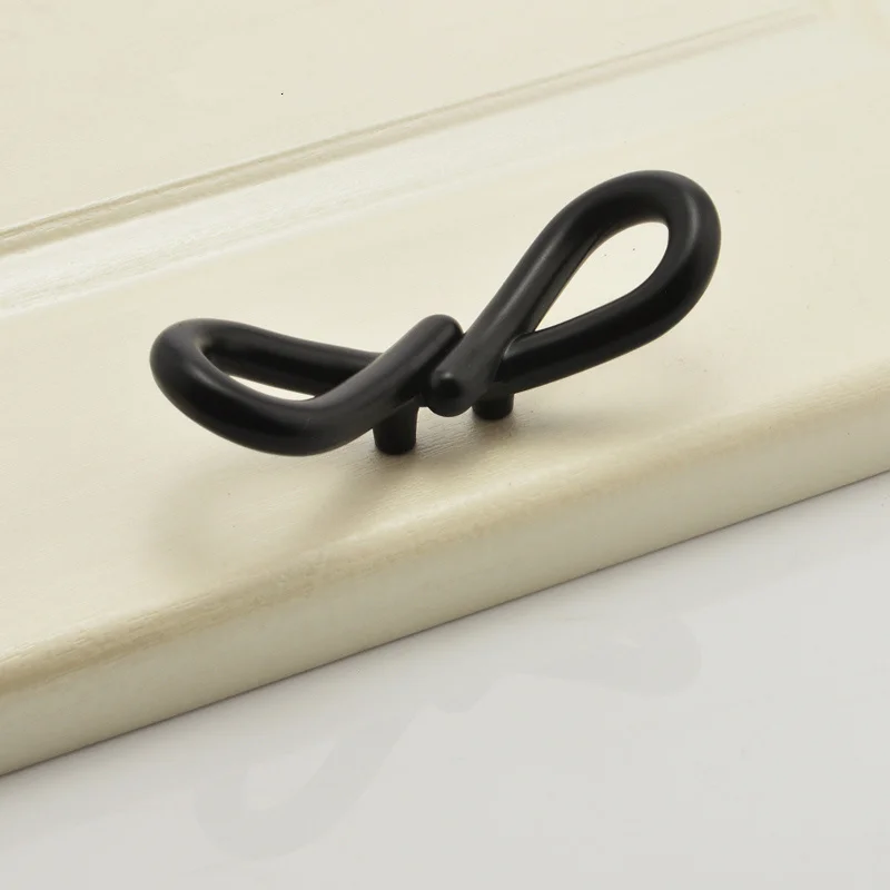 

Hot sale black bow tie design cupboard wardrobe handle drawer knobs Pulls cabinet door handle furniture hardware,Free shipping.