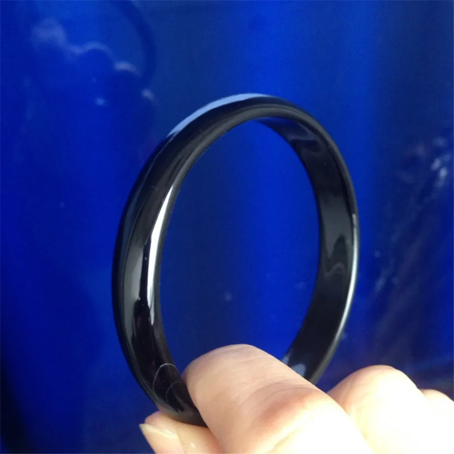 Женский браслет с круглым кристаллом черный внутренним диаметром из