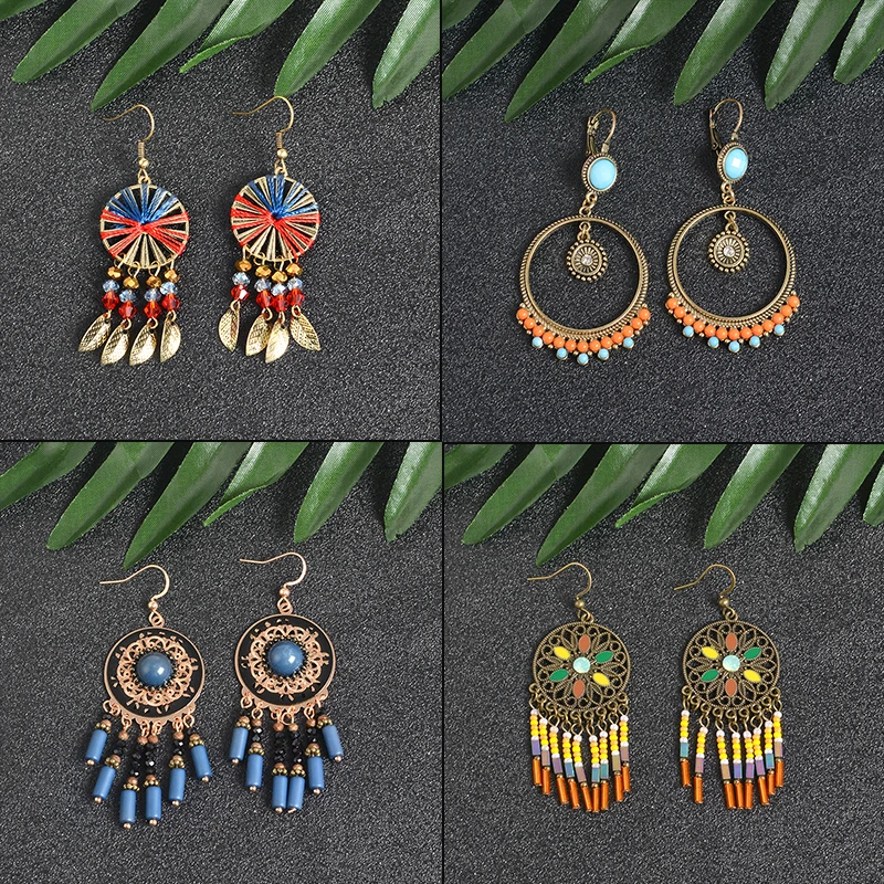 Круглые металлические длинные серьги с кисточками и листьями богемные бронзовые