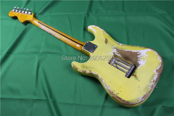

Classical relic st electric guitar,big headstock, double color finish.handmade aged details