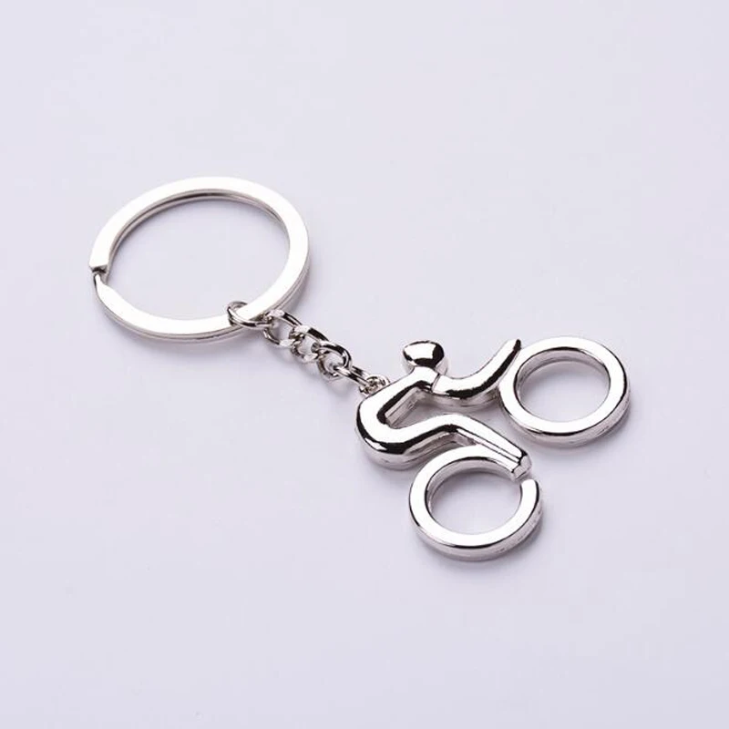 (12 шт./лот) Модные персональные Олимпийские игры человек ездить на велосипеде