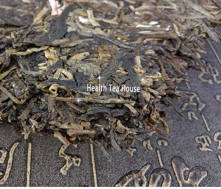 2012 Yr Yi Wu Millenary Old Tree Wild Shen Pu-erh 357 г, ветреное специальное железное сырье Pu-erh торт