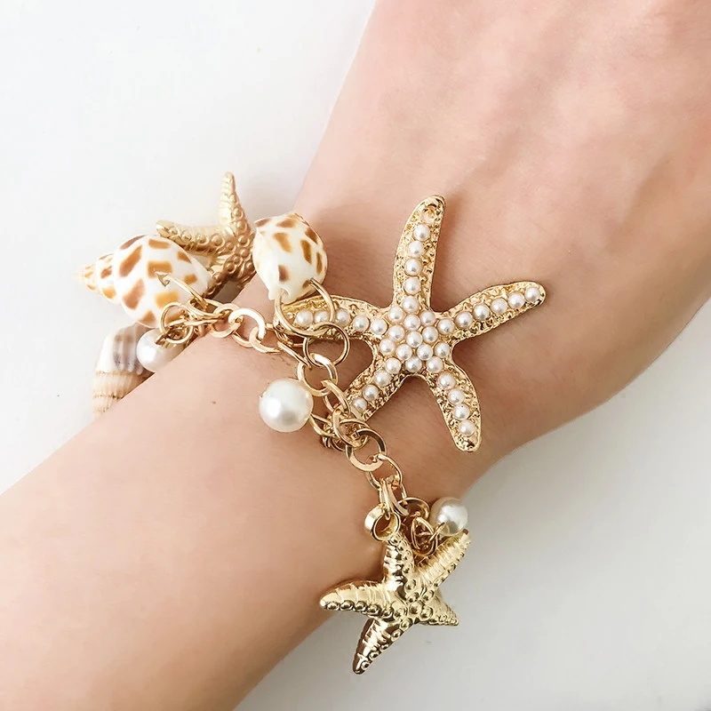 Браслет с ракушками и морскими звездами регулируемый металлический золотистый