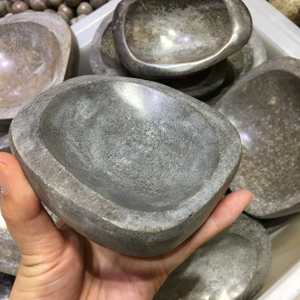 Натуральная пепельница из ископаемого камня в форме кости динозавра