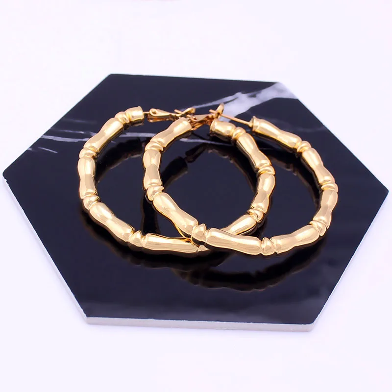 

The popular golden round earrings exaggerated style is similar to the bamboo shape simple and fashionable earrings women jewelry
