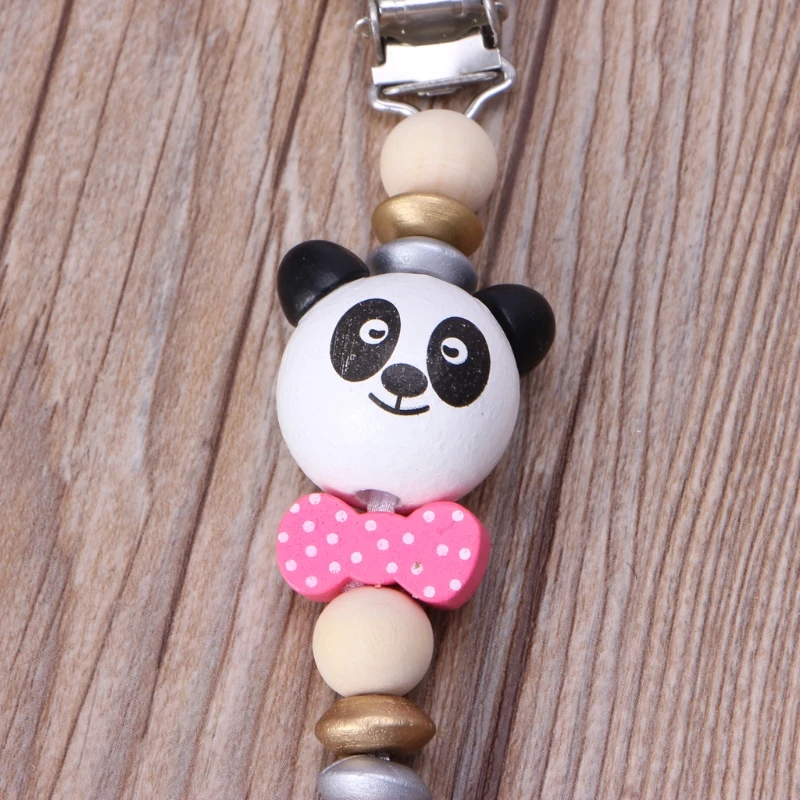 Милая детская деревянная соска для использования при прорезывании зубов