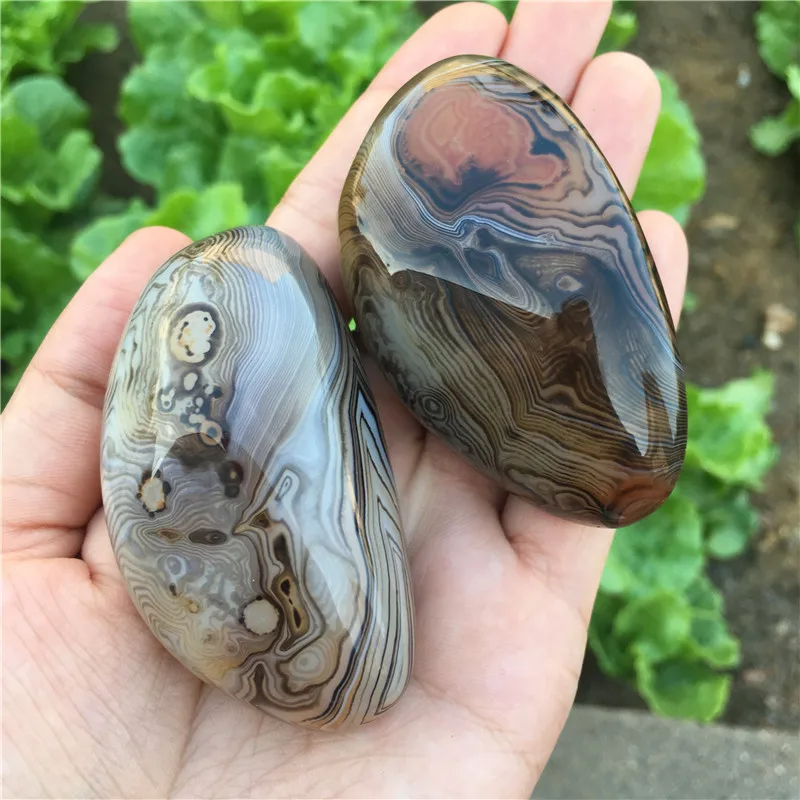 Фотообои! Красивые Натуральные драгоценные камни и минералы sardonyx с ладонью