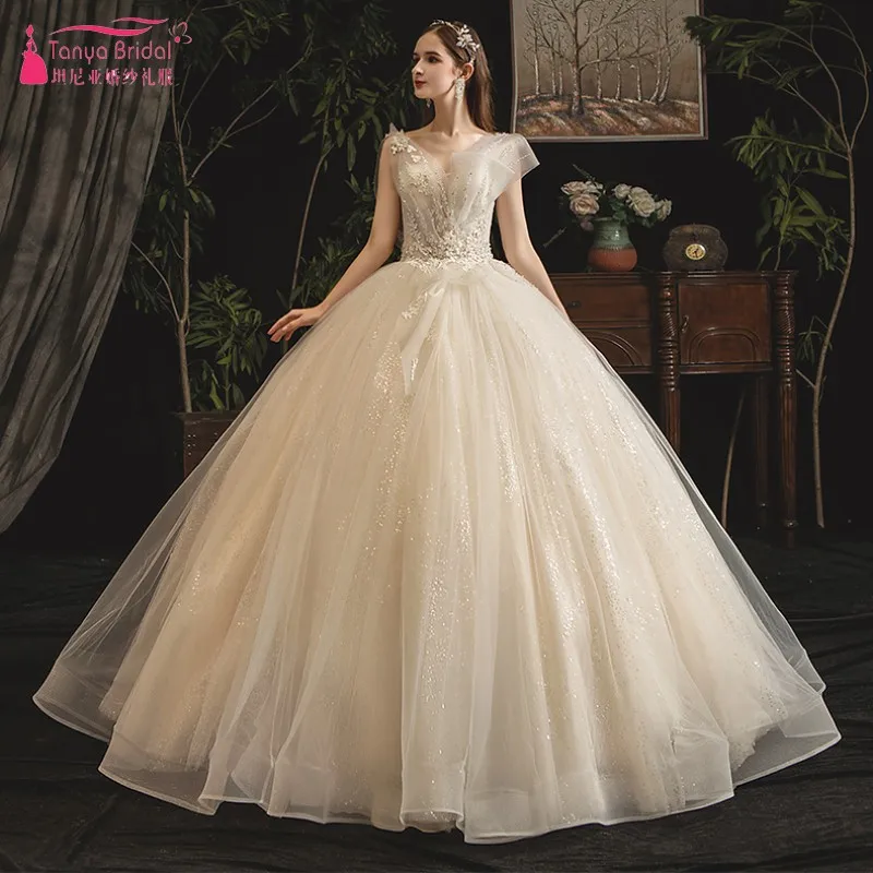 

2019 Luxury Champagne Middle East Wedding Dress Sleeveless Bling Bling Arabic Bridal Gowns Court Train Bridal Gown DQG925