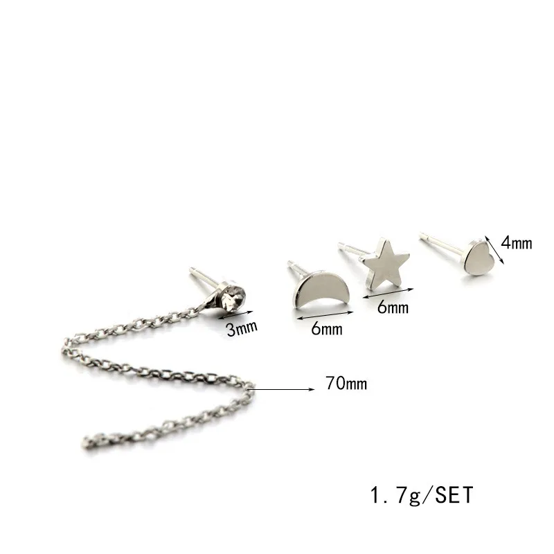 Серьги-гвоздики с подвесками в виде звезд Луны и сердца серебристого цвета |