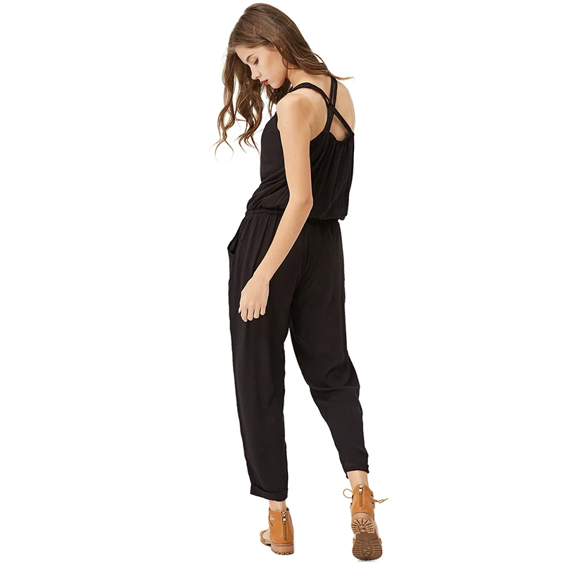 Женский комбинезон на пуговицах черный элегантный без рукавов с открытой спиной