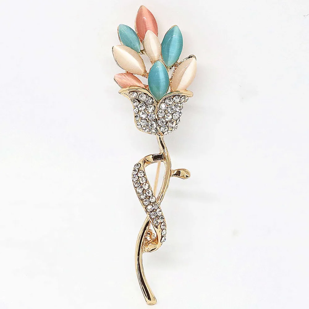 Брошь с длинным цветком белые хрустальные цветные кошачьи глаза изысканные