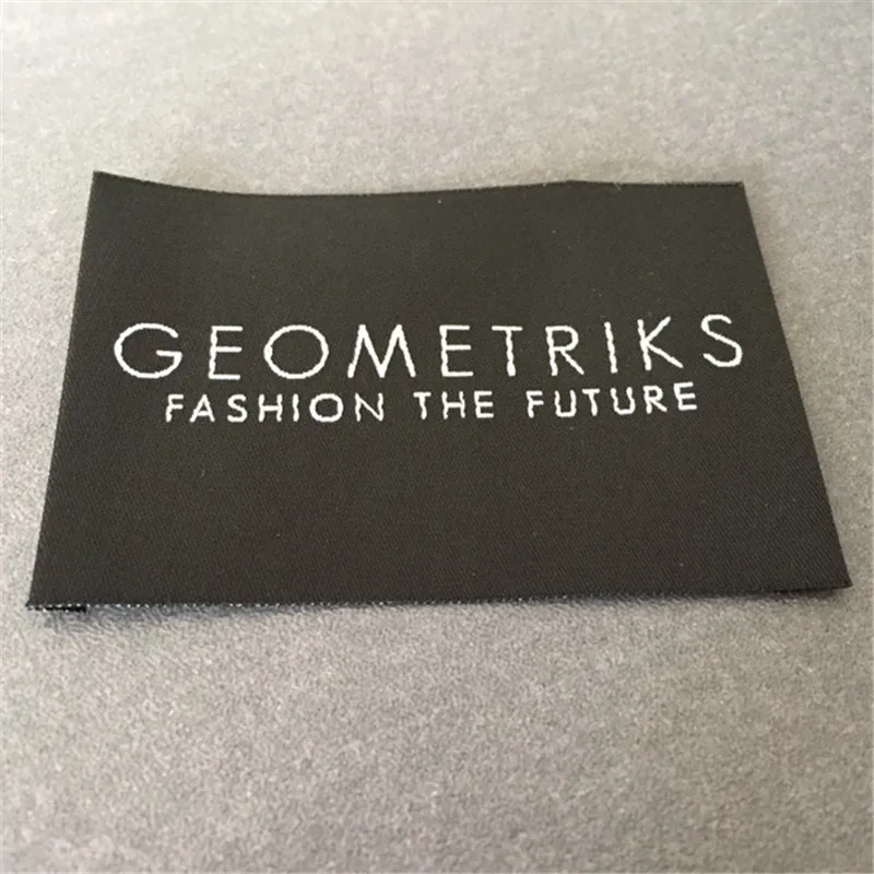 

Customized black background woven labels clothing main labels custom garment tags